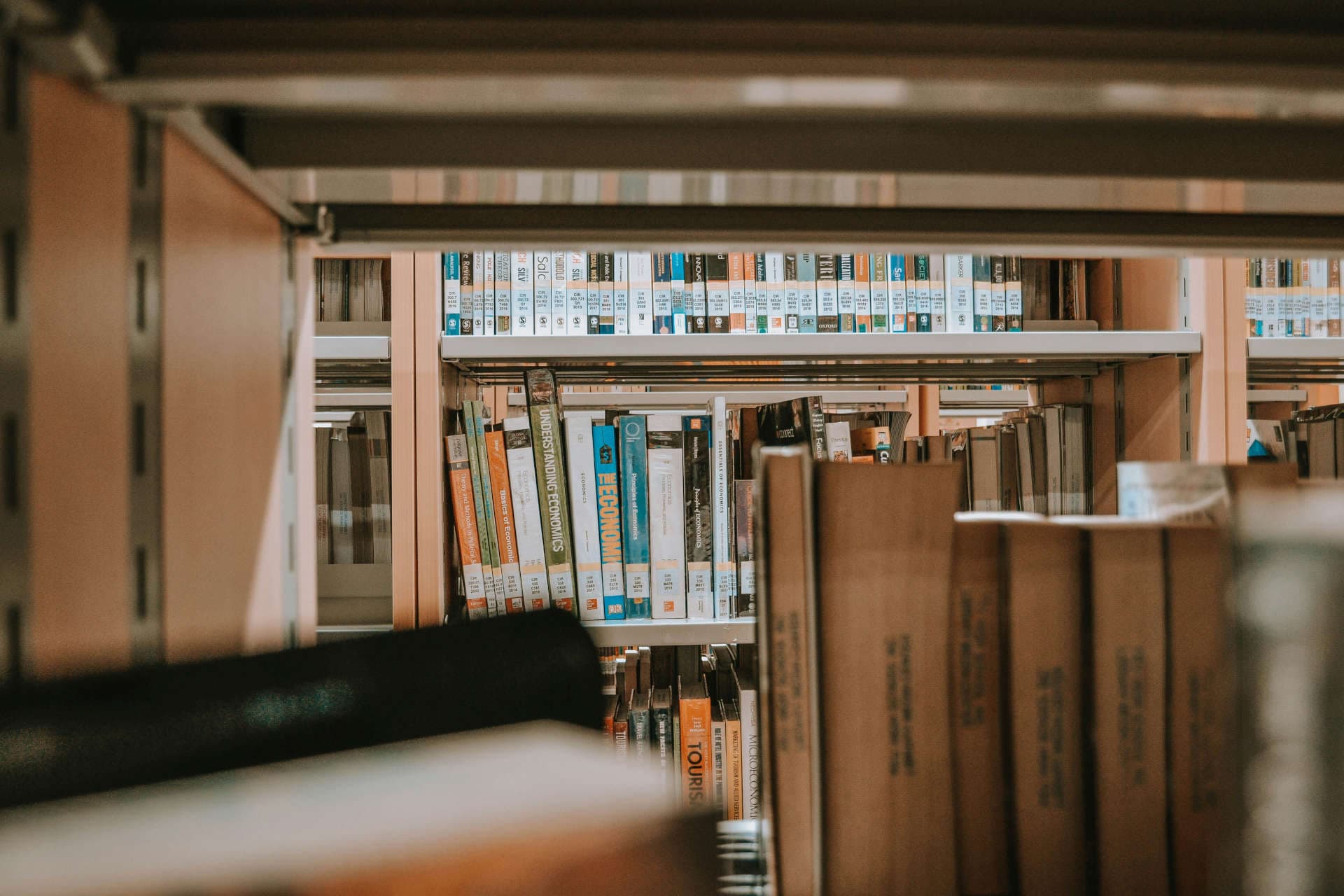 Several books in a bookshelf.